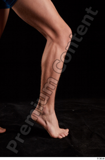 Matthew  1 calf flexing nude side view 0006.jpg